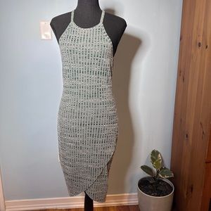 Silence and noise wrap body con dress in green